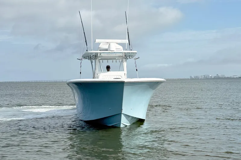 Slide: The Image of 2018 SeaHunter 35 Tournament boat cruising on open water. - 3