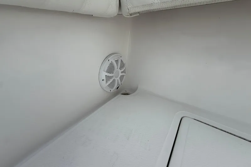 Slide: The Image of 2018 SeaHunter 35 Tournament boat interior with speaker and storage compartment. - 32
