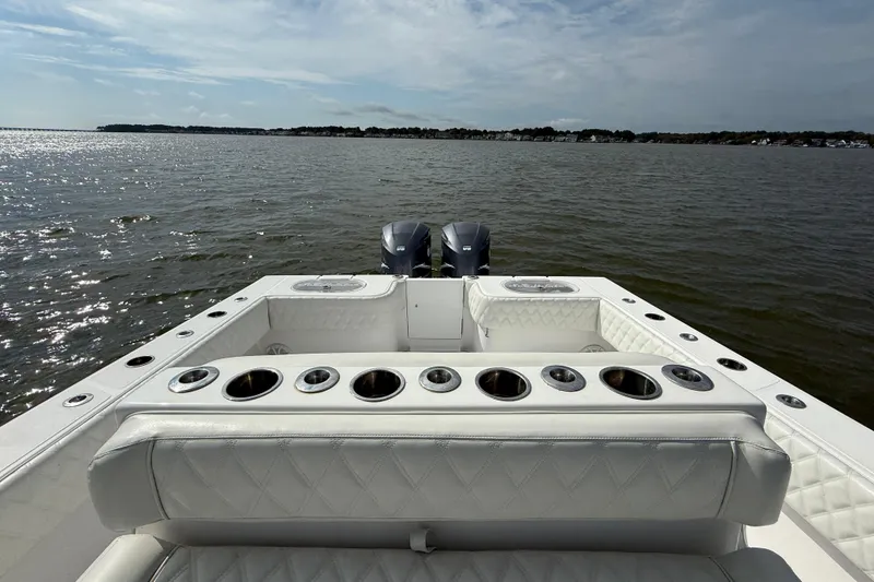 Slide: The Image of 2018 SeaHunter 35 Tournament boat with dual engines on a calm sea. - 39