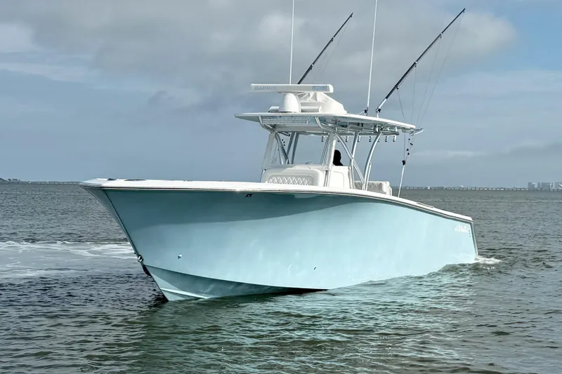 Slide: The Image of 2018 SeaHunter 35 Tournament boat cruising on open water. - 4