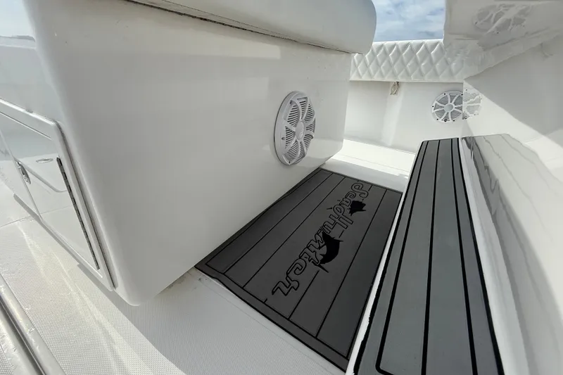 Slide: The Image of 2018 SeaHunter 35 Tournament boat interior with custom flooring and speaker system. - 46