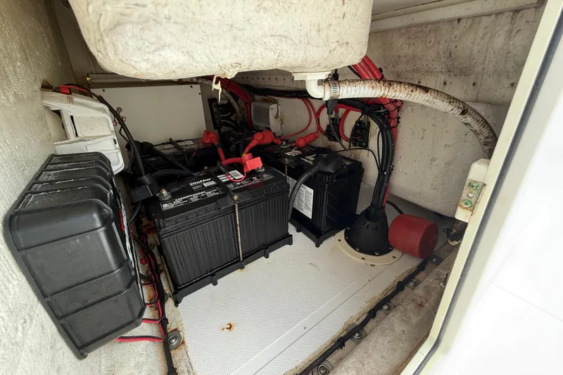 Slide: The Image of 2018 SeaHunter 35 Tournament boat battery compartment with wiring and components. - 48