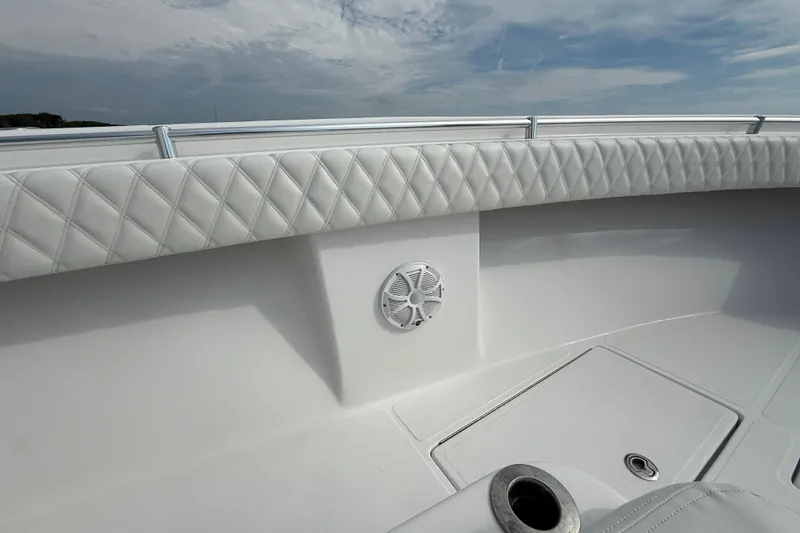 Slide: The Image of 2018 SeaHunter 35 Tournament boat interior with quilted upholstery and speaker. - 92