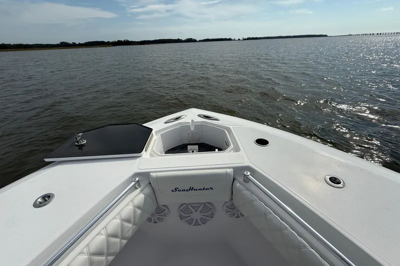Slide: The Image of Bow view of 2018 SeaHunter 35 Tournament boat on open water. - 98