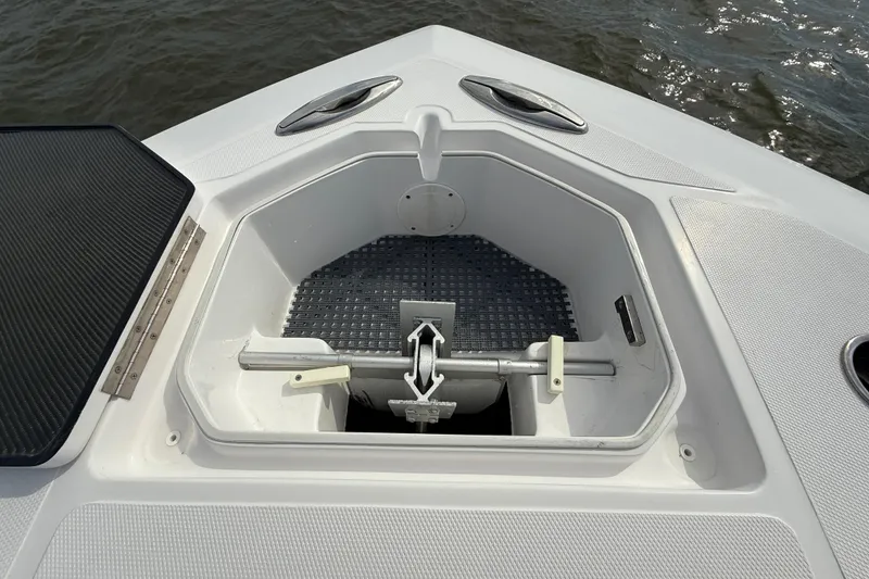 Slide: The Image of Anchor storage compartment on 2018 SeaHunter 35 Tournament boat, open and empty. - 99