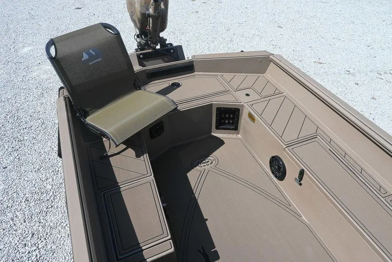 Slide: The Image of 2026 Thor 1754 boat interior with seating and control panel. - 7
