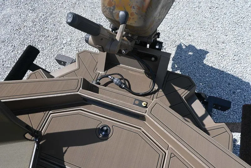 Slide: The Image of Top view of a 2026 Thor 1754 boat deck with control panel and cables. - 8