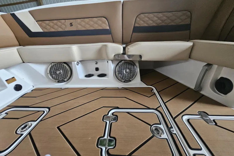 Slide: The Image of Interior of 2025 Varatti Z2373 boat with stylish seating and modern audio system. - 10