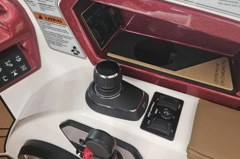 Slide: The Image of Control panel of 2025 Varatti Z2373 boat with joystick and warning labels. - 17