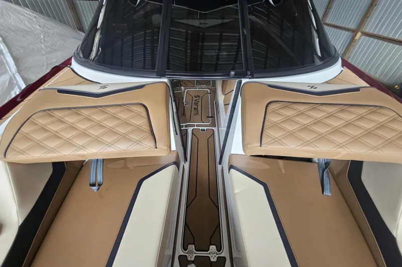 Slide: The Image of 2025 Varatti Z2373 boat interior with tan quilted seats and sleek design. - 19