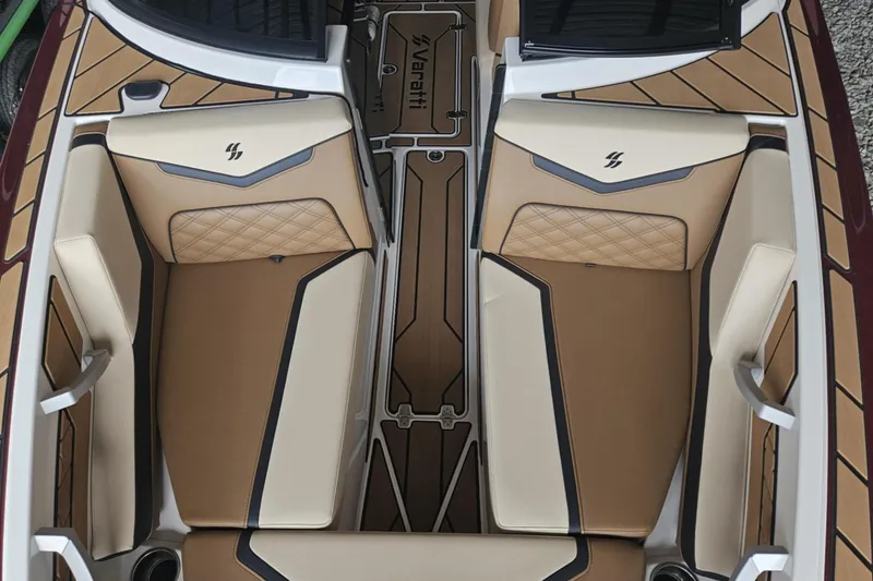 Slide: The Image of 2025 Varatti Z2373 boat interior with tan and black seating, featuring diamond stitching. - 6