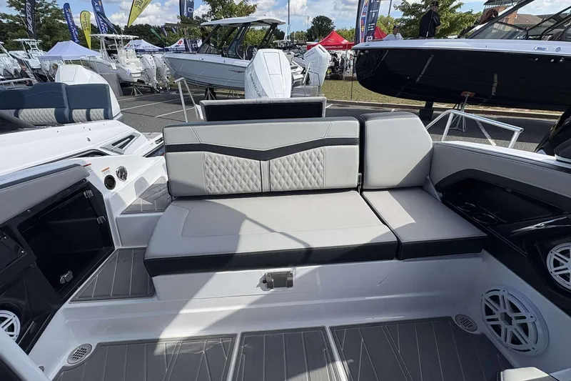 Slide: The Image of 2026 Monterey 275SS Super Sport boat interior with sleek seating and modern design. - 12