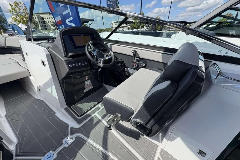 Slide: The Image of 2026 Monterey 275SS Super Sport boat interior with modern dashboard and seating. - 16