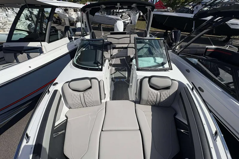 Slide: The Image of 2026 Monterey 275SS Super Sport boat interior with luxurious seating and modern design. - 26