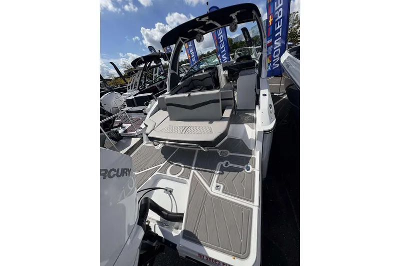 Slide: The Image of 2026 Monterey 275SS Super Sport boat with sleek interior and modern design. - 7