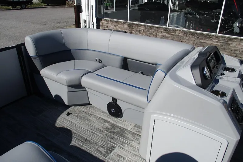 Slide: The Image of 2026 Bentley Pontoons 223 Bolt interior with gray seating and modern dashboard. - 11