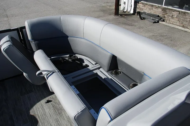 Slide: The Image of 2026 Bentley Pontoons 223 Bolt interior seating with storage and cup holders. - 12