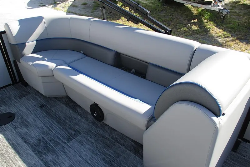 Slide: The Image of 2026 Bentley Pontoons 223 Bolt interior seating with gray upholstery and blue accents. - 20