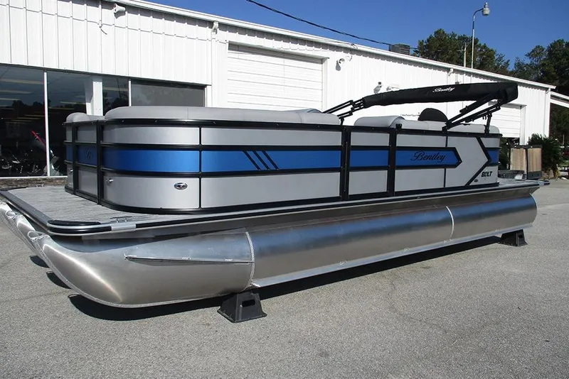 Slide: The Image of 2026 Bentley Pontoons 223 Bolt pontoon boat with sleek design and blue accents. - 3