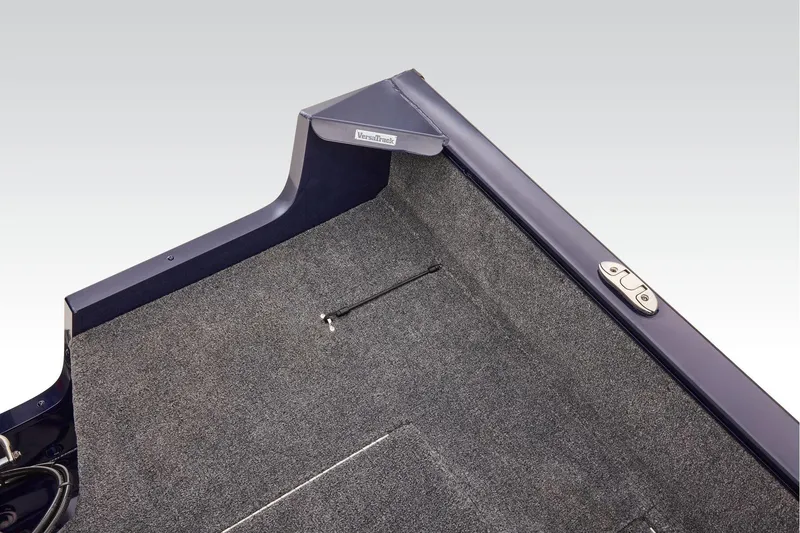 Slide: The Image of Manufacturer Provided Image: 2026 Tracker Pro Guide V-175 WT boat interior with carpeted floor and storage compartment. - 40