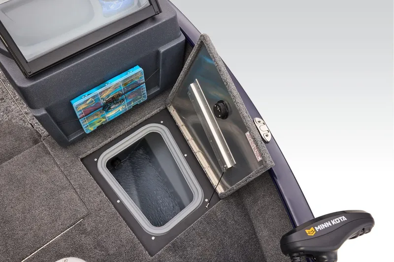 Slide: The Image of Manufacturer Provided Image: 2026 Tracker Pro Guide V-175 WT boat interior with storage compartment and Minn Kota motor. - 23
