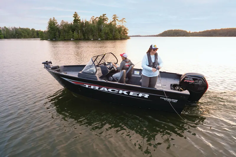 Slide: The Image of Manufacturer Provided Image: 2026 Tracker Pro Guide V-175 WT boat on a serene lake with two people fishing. - 44
