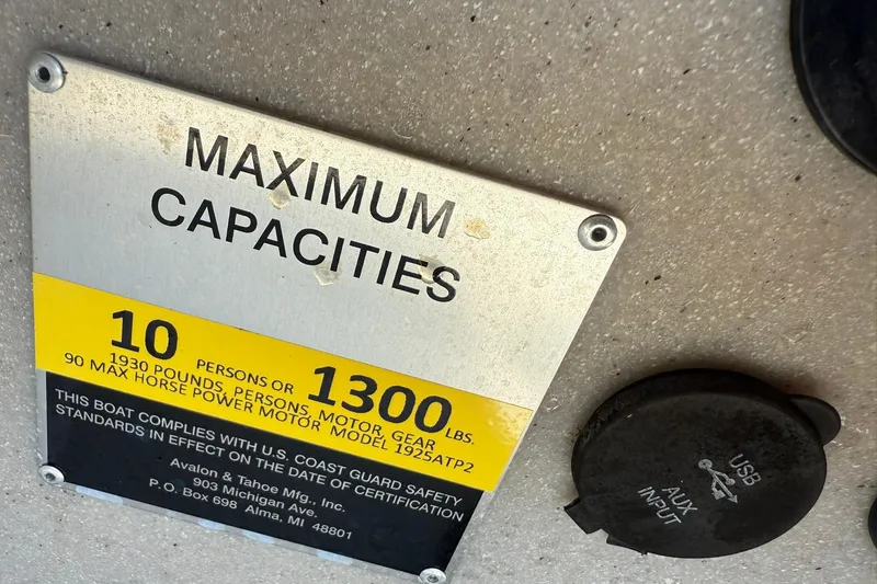 Slide: The Image of 2018 Avalon GS Cruise II boat capacity plate, 10 persons or 1300 lbs, USB/AUX input. - 14