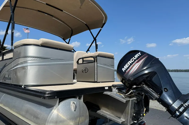 Slide: The Image of 2018 Avalon GS Cruise II pontoon boat with Mercury outboard motor on a sunny day. - 3