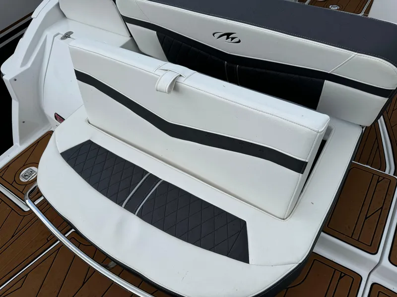 Slide: The Image of 2022 Monterey 258 Super Sport boat seating with white and black upholstery. - 4