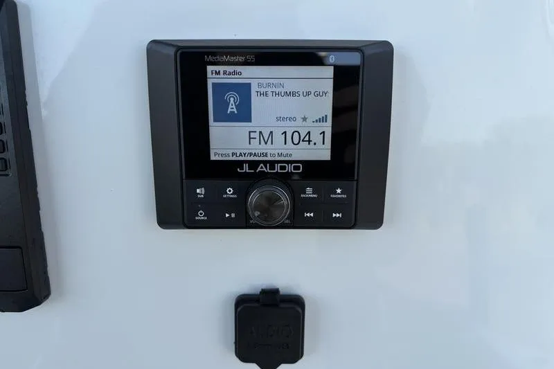 Slide: The Image of JL Audio MediaMaster display on Pioneer Islander 222, tuned to FM 104.1. - 20
