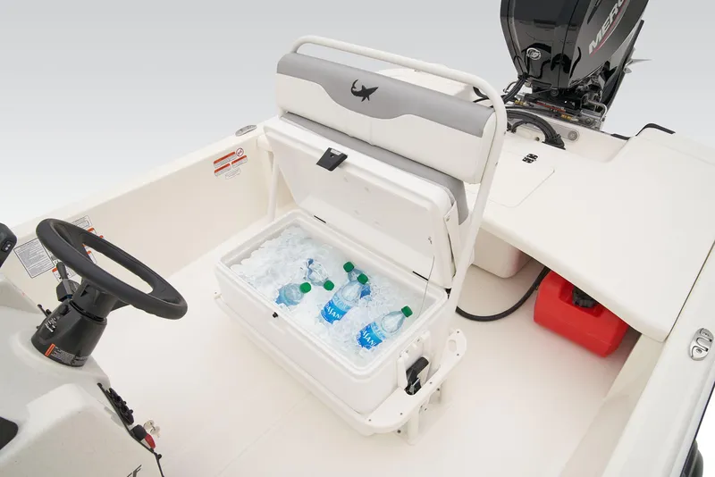 Slide: The Image of 2026 Mako Pro Skiff 17 CC boat interior with cooler and water bottles. - 36