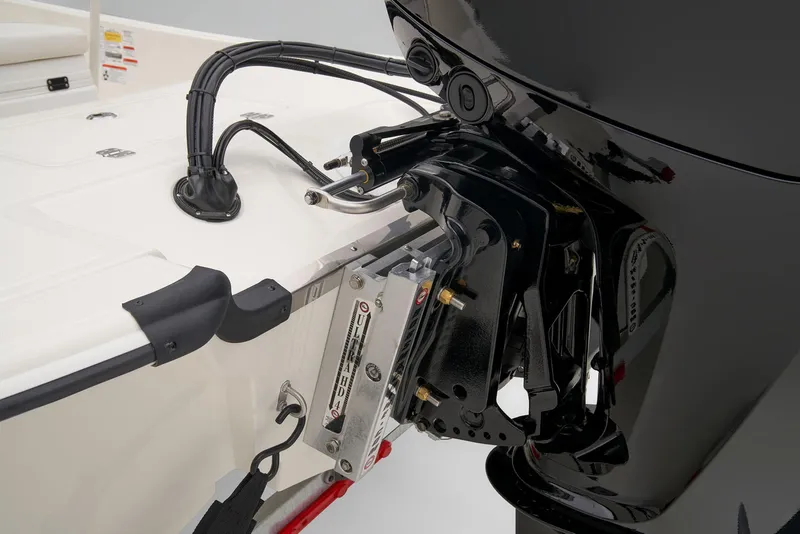 Slide: The Image of 2026 Mako Pro Skiff 17 CC boat engine detail, showcasing motor and mounting components. - 44