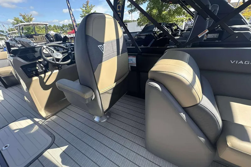 Slide: The Image of Interior of 2026 Viaggio x22u boat with modern seating and steering wheel. - 18
