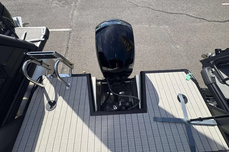Slide: The Image of Rear view of Viaggio x22u 2026 boat with outboard motor and deck details. - 20