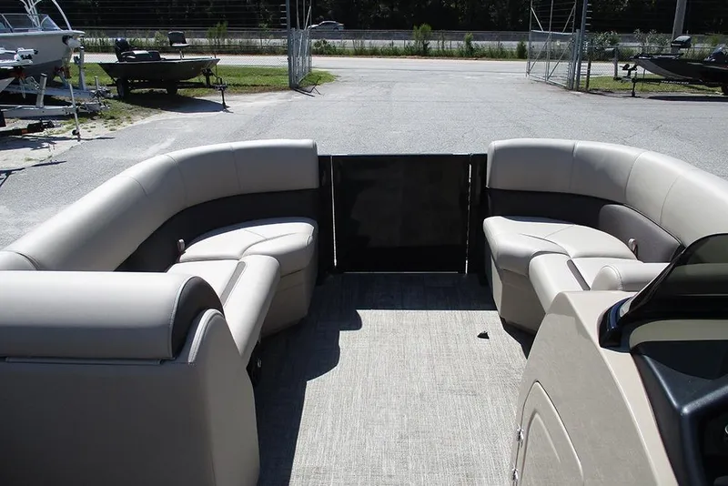 Slide: The Image of 2026 Bentley Pontoons 223 Legacy Swingback interior with plush seating and modern design. - 11