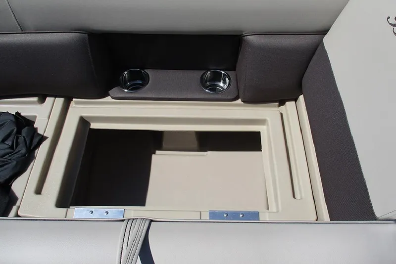 Slide: The Image of 2026 Bentley Pontoons 223 Legacy Swingback seating with storage compartment and cup holders. - 14