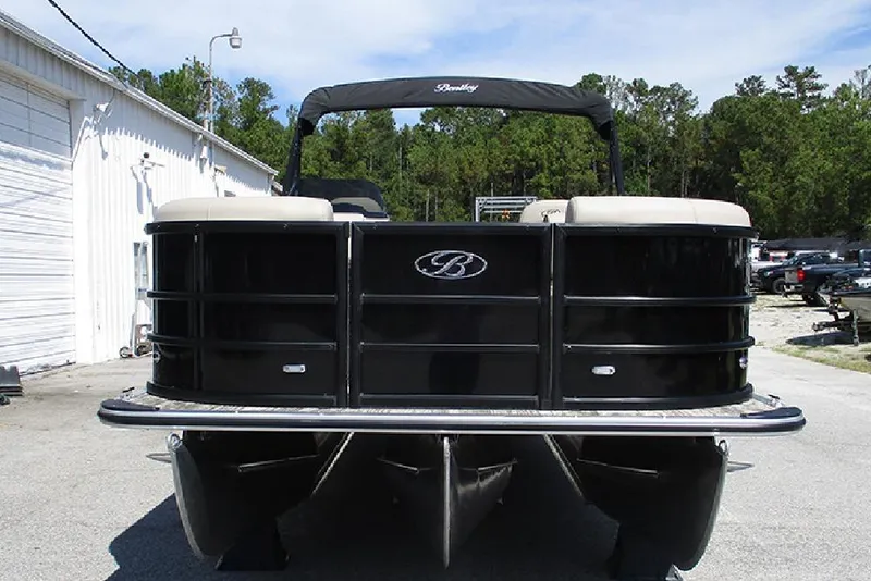 Slide: The Image of 2026 Bentley Pontoons 223 Legacy Swingback, black exterior, parked outdoors. - 4