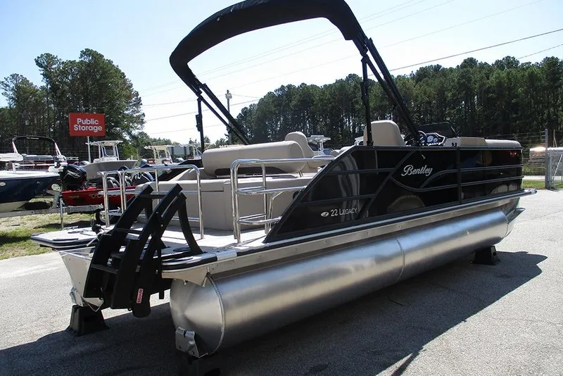 Slide: The Image of 2026 Bentley Pontoons 223 Legacy Swingback pontoon boat with sleek design and modern features. - 7