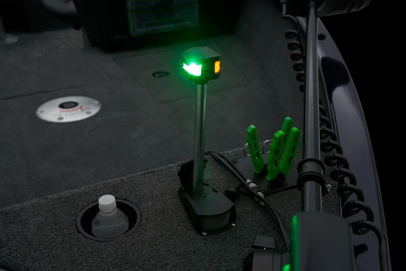 Slide: The Image of Manufacturer Provided Image: 2026 Tracker Pro Guide V-175 Combo boat interior with green navigation light. - 21