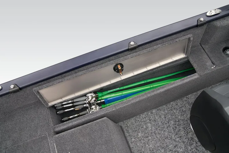 Slide: The Image of Manufacturer Provided Image: 2026 Tracker Pro Guide V-175 Combo boat rod storage compartment with fishing rods. - 44