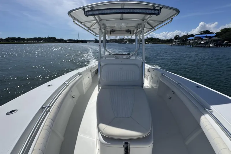 Slide: The Image of 2006 Southport 28 Center Console boat cruising on a sunny day. - 13