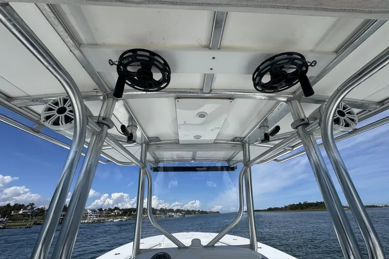 Slide: The Image of 2006 Southport 28 Center Console boat with T-top and ocean view. - 15