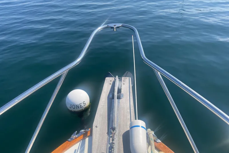 Slide: The Image of Cockpit of 1998 Little Harbor WhisperJet 36 with wooden steering wheel and navigation instruments. - 6