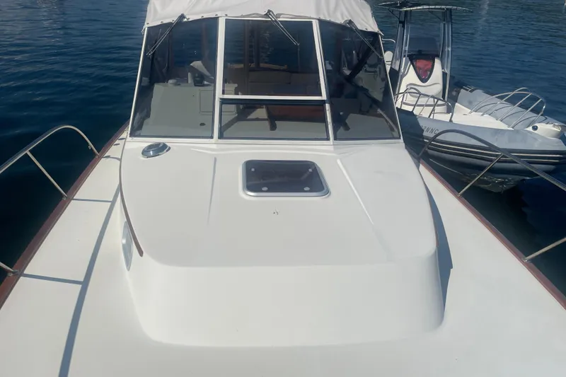 Slide: The Image of Radar equipment on 1998 Little Harbor WhisperJet 36 under clear blue sky. - 7