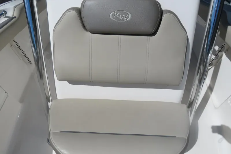 Slide: The Image of 2021 Key West 239 FS boat seat with KW logo, featuring sleek design and comfortable padding. - 20