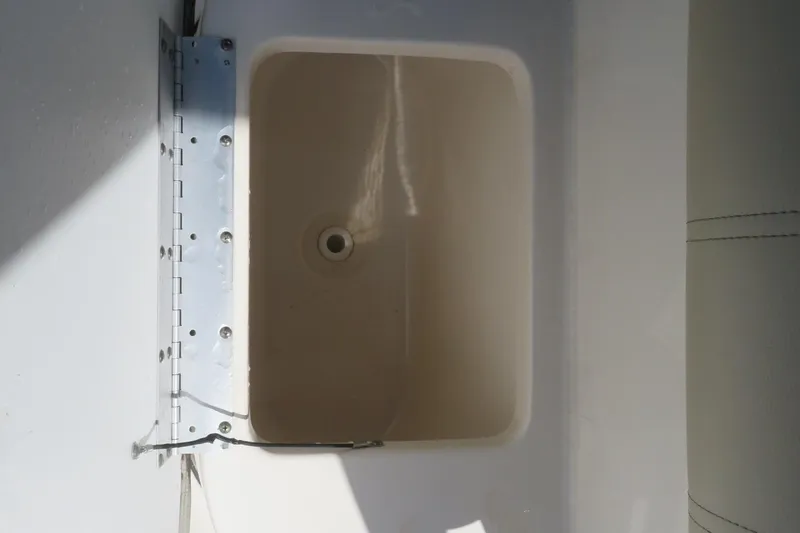 Slide: The Image of 2021 Key West 239 FS boat compartment with hinge detail. - 21