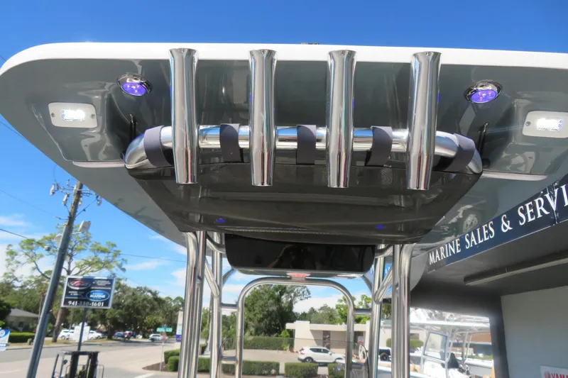 Slide: The Image of 2021 Key West 239 FS boat with rod holders and LED lights on the T-top. - 39