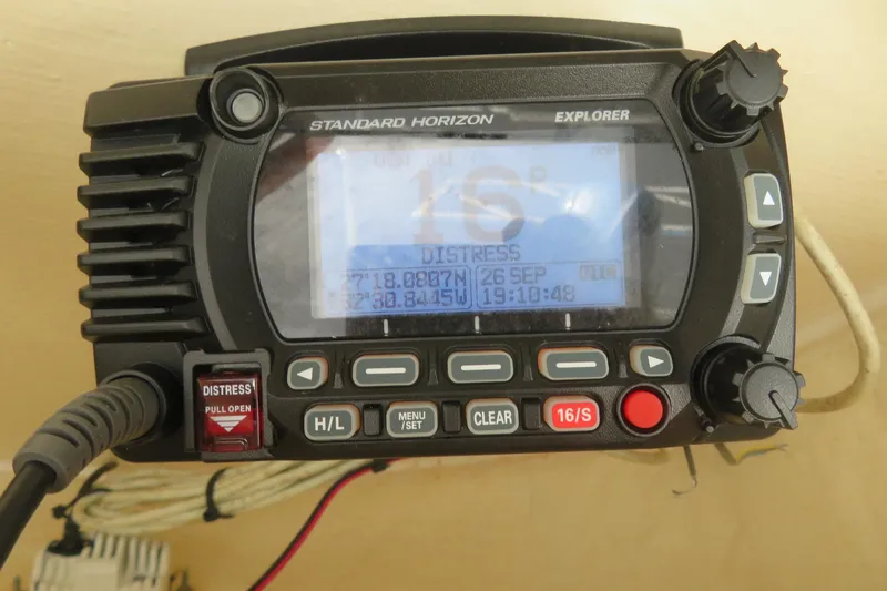 Slide: The Image of Standard Horizon Explorer marine radio displaying distress signal on Key West 239 FS, 2021 model. - 41