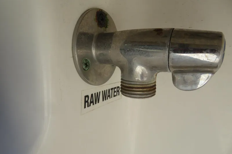 Slide: The Image of Raw water outlet on 2021 Key West 239 FS boat, chrome finish. - 44