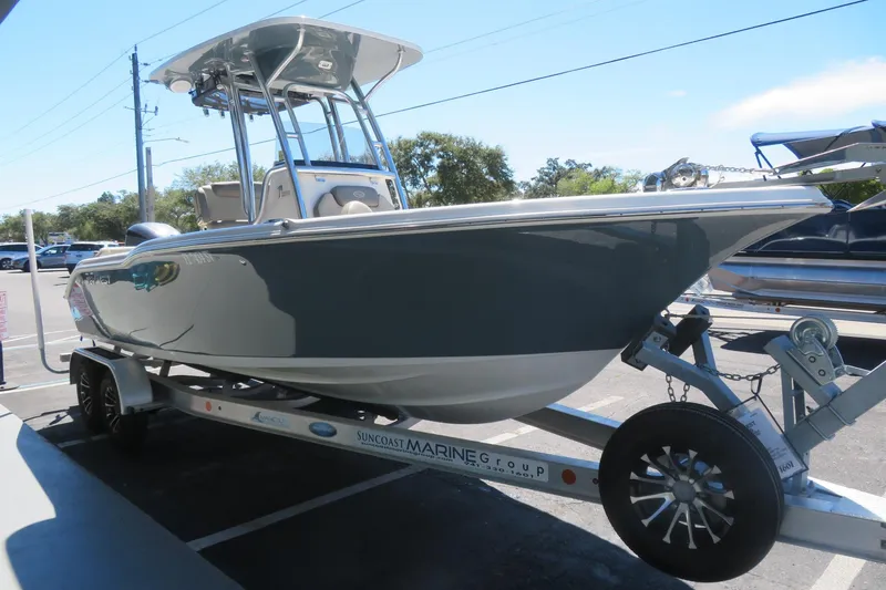 Slide: The Image of 2021 Key West 239 FS boat on trailer in parking lot. - 5